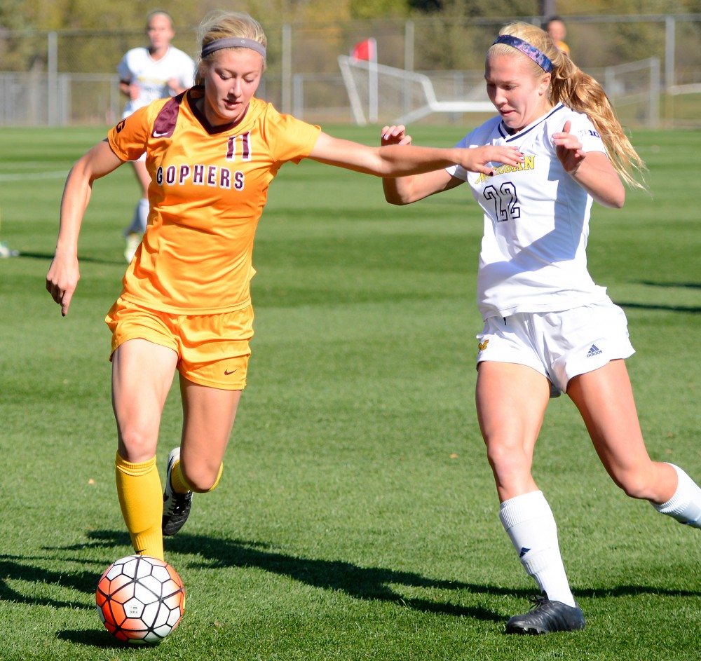 Junior Midfielder Josee Stiever dribbles the ball at the Elizabeth Lyle Robbie Stadium on Sunday where the Gophers tied the University of Michigan 0-0 in overtime.