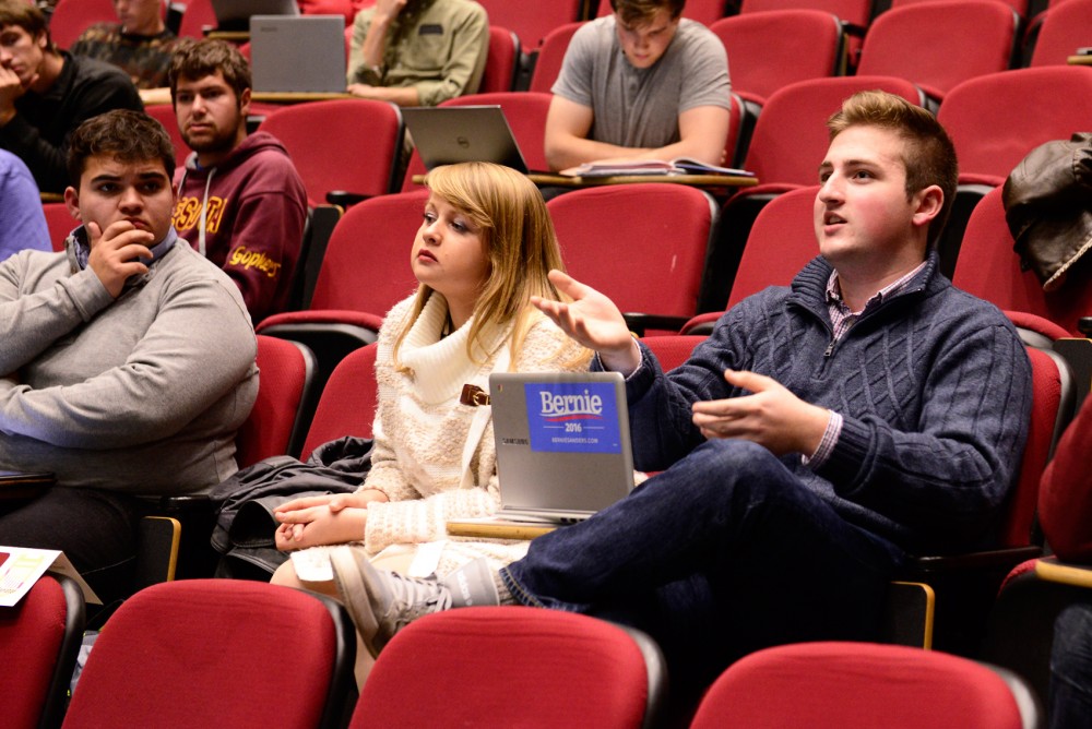 Sophomore Tom Wyatt-Yerka poses a question to Director of Undergraduate Student Initiatives LeeAnn Melin about the undergraduate advising process during the MSA meeting in the Molecular and Cellular Biology building on Tuesday, Oct. 27.  
