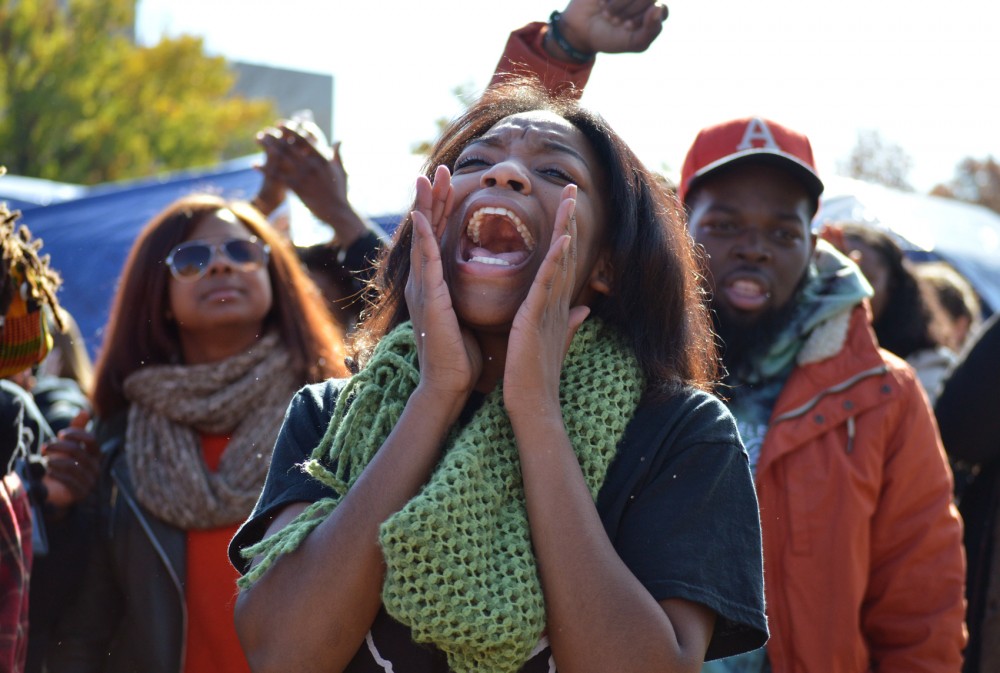 Following months of student protest and controversies at the University of Missouri, its system president resigned Monday morning. Soon after the announcement, a crowd of more than 500 rallied at the schools Carnahan Quad, where students, faculty and other demonstrators chanted in celebration of their movements success.