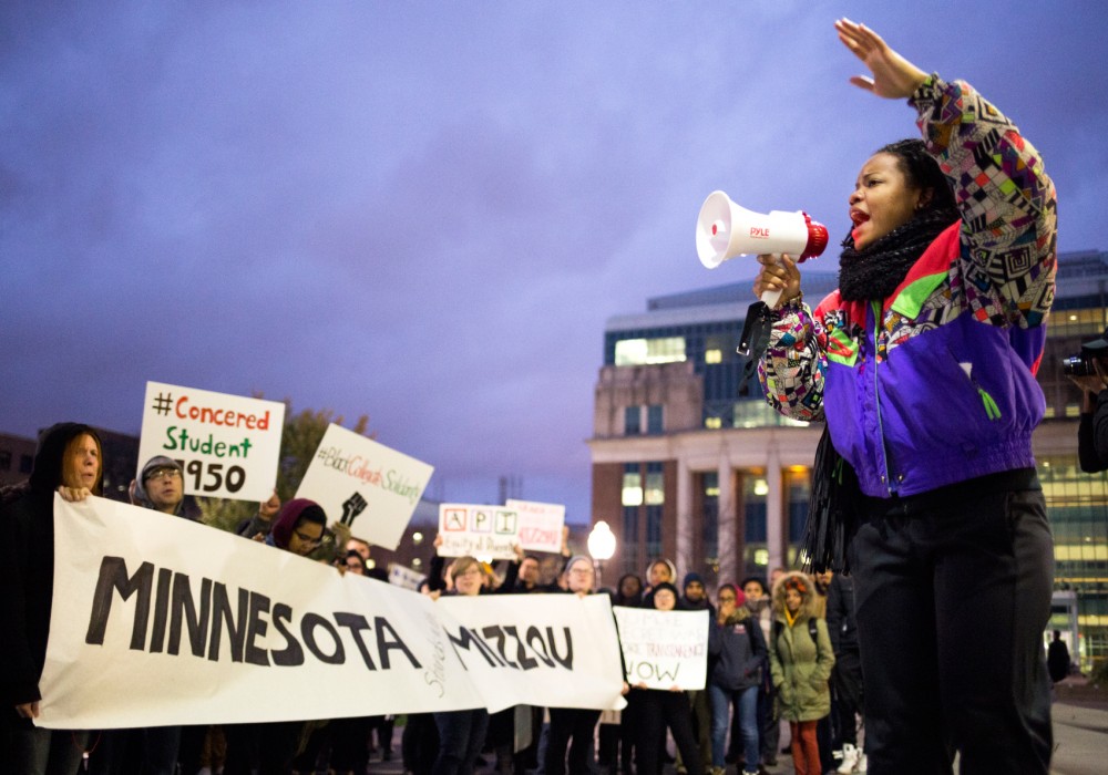 Junior Natasha Moore, a communications agent of the African-American & African Studies program, kicks off the demonstration hosted by the Universitys Black Student Union outside of Coffman Memorial Union on Thursday. 