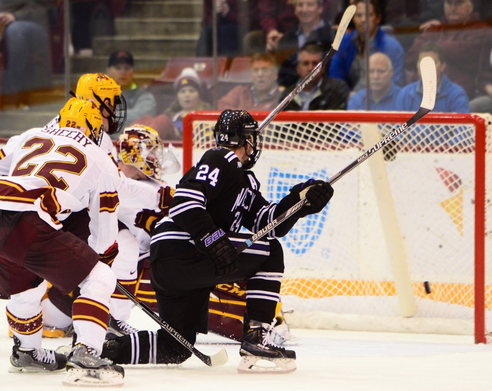 Mavericks forward Brett Knowles scores his third period goal to tie up and bring the game into overtime at Mariucci Arena on Saturday.
