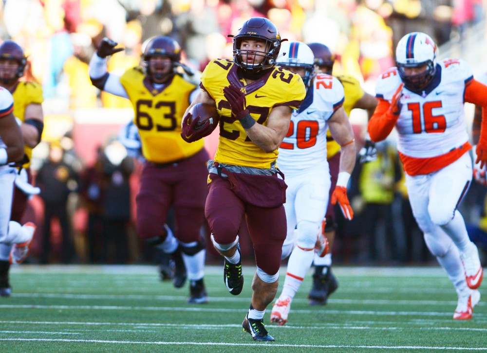 Gophers running back Shannon Brooks runs for a 75-yard touchdown late in the fourth quarter on Saturday at TCF Bank Stadium where Minnesota defeated Illinois 32-23. The touchdown, followed by a 2-point conversion took the gophers up 8 points, giving them a more comfortable lead.
