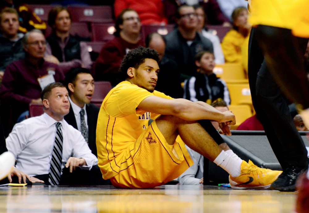 Freshman forward guard Jordan Murphy watches the Gophers play against South Dakota State in Williams Arena on Tuesday night.
