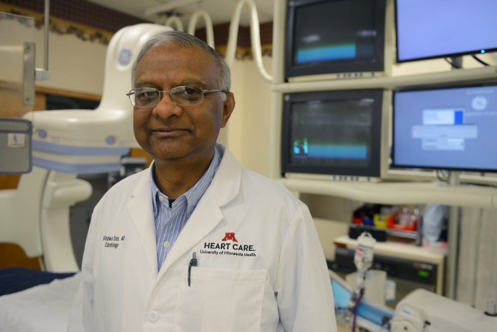 University Interventional Cardiologist Dr. Gladwin Das poses for a portrait in the Cath Lab at the University of Minnesota Medical Center on Monday. Das is giving some patients struggling with heart issues a new device called the Parachute, a possible alternative to electronic implants or heart transplants.