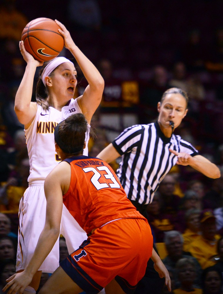 Senior Shayne Mullaney faces pressure from Illinois defense at Williams Arena on Tuesday, Jan. 26.