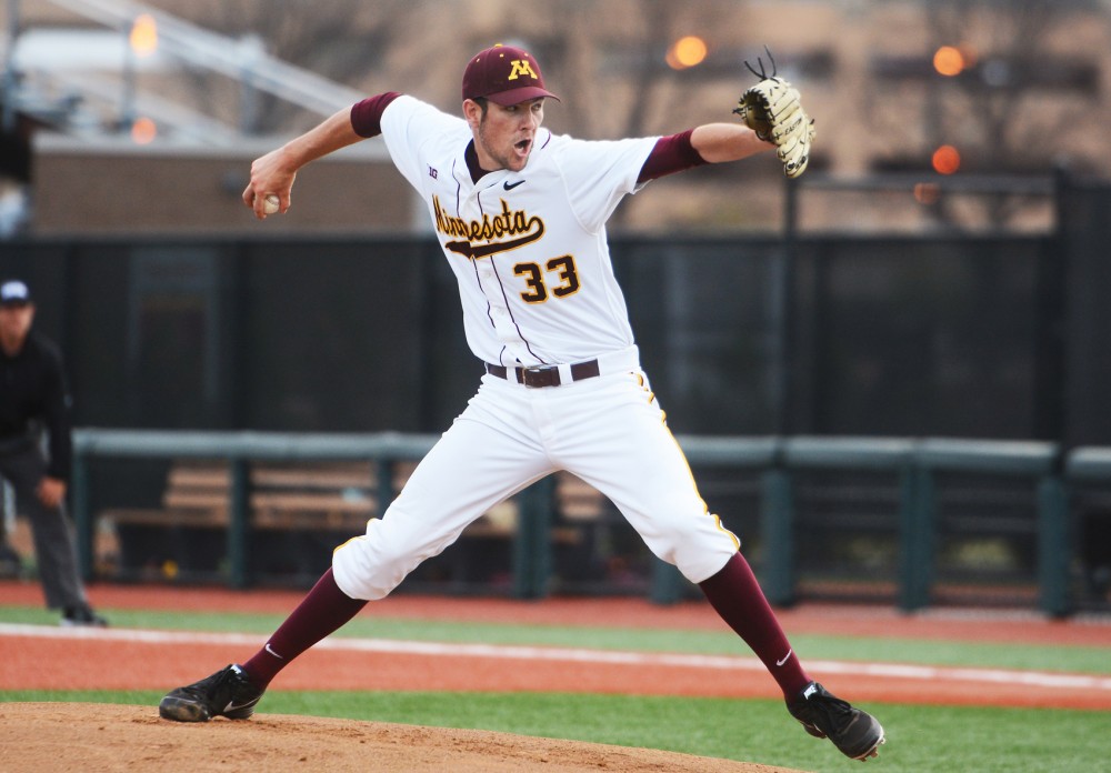 Gophers pitcher Toby Anderson throws the ball against Kansas State at Siebert Field on April 28, 2015.