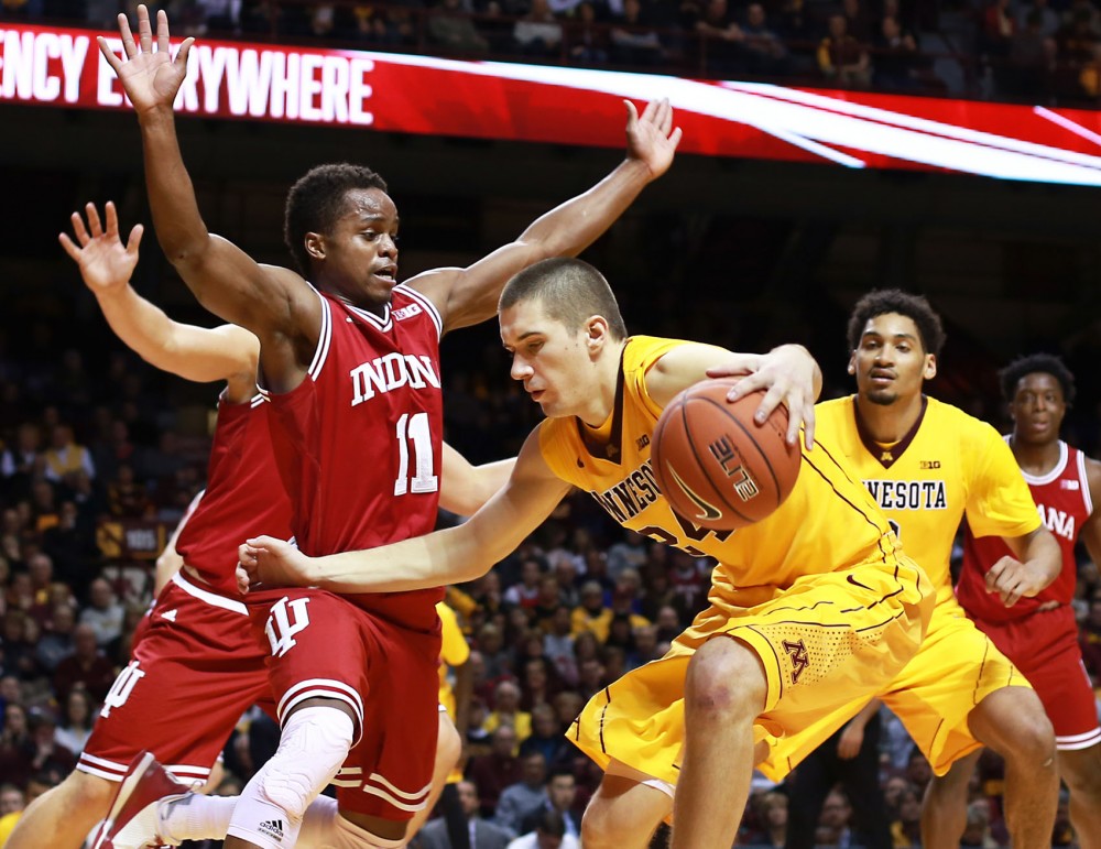 Minnesota forward Joey King pushes through Indiana’s defense at Williams Arena on Saturday, Jan. 16 where the Gophers lost to the Hoosiers 70-63.