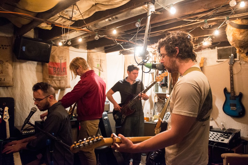 Local band Poolboy runs through songs in their practice space on Tuesday night, ahead of their EP release show at the 7th Street Entry on Feb. 28.