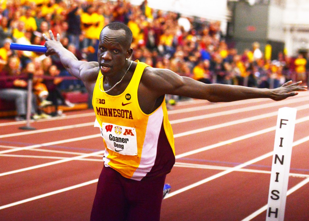 Goaner Deng crosses the finish line of the mens 400-meter relay race at the University of Minnesota Field House on Jan. 23.