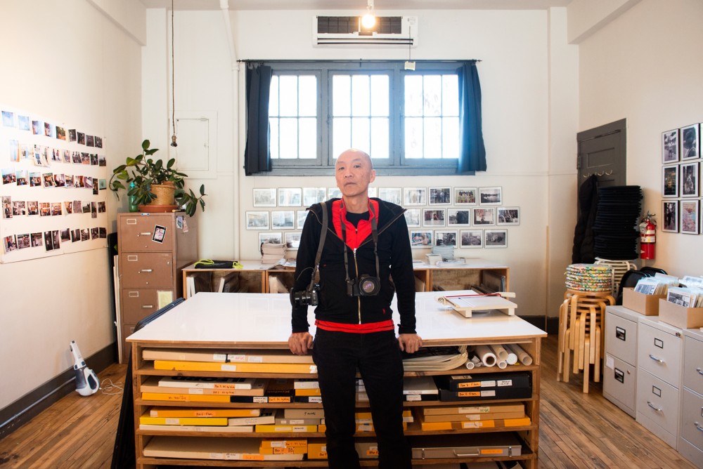 Minneapolis photographer Wing Young Huie poses in his studio at the Third Place Gallery on Tuesday afternoon. Huie is leading a free workshop at the Weisman Art Museum on Friday titled, WE ARE THE OTHER, which seeks to engage the campus community through photography.