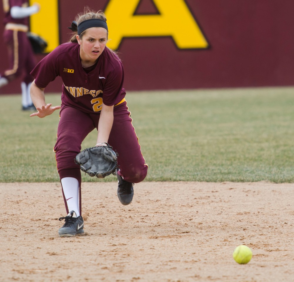 Sophomore Danielle Parlich fields a ground ball between innings at Jane Sage Cowles Stadium, April 4.