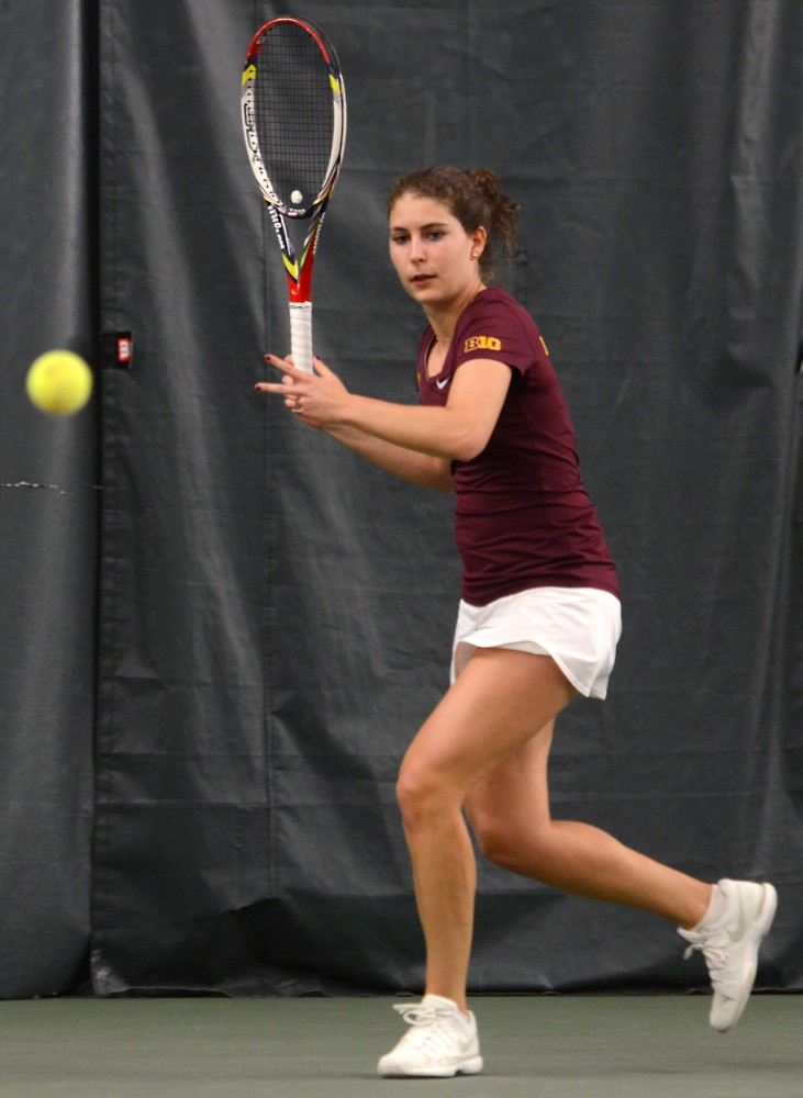 Senior Paula Rincon-Otero prepares to return the ball to Penn State in the Baseline Tennis Center Friday afternoon. 