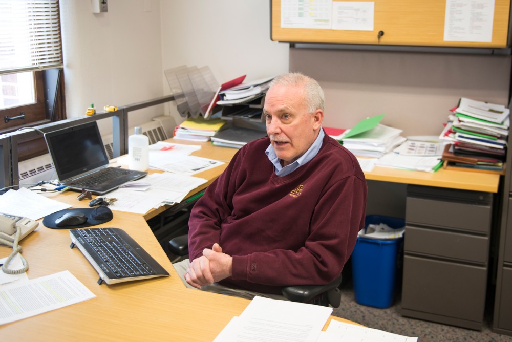 University of Minnesota Chief Financial Officer and Vice President Richard Fitz Pfutzenreuter sits in his office in Morrill Hall the morning of March 4. Fitz is retiring after nearly 25 years at the University.