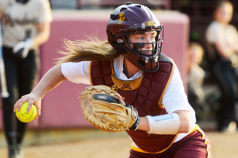 Minnesota catcher Taylor LeMay winds up to throw the ball at the Jane Sage Cowles Stadium on May 1, 2015.