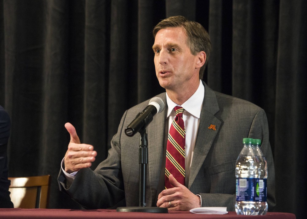 Mark Coyle, the newly named Gopher Athletics Director answers the medias questions during a press conference held at TCF Bank Stadium on Wednesday. 