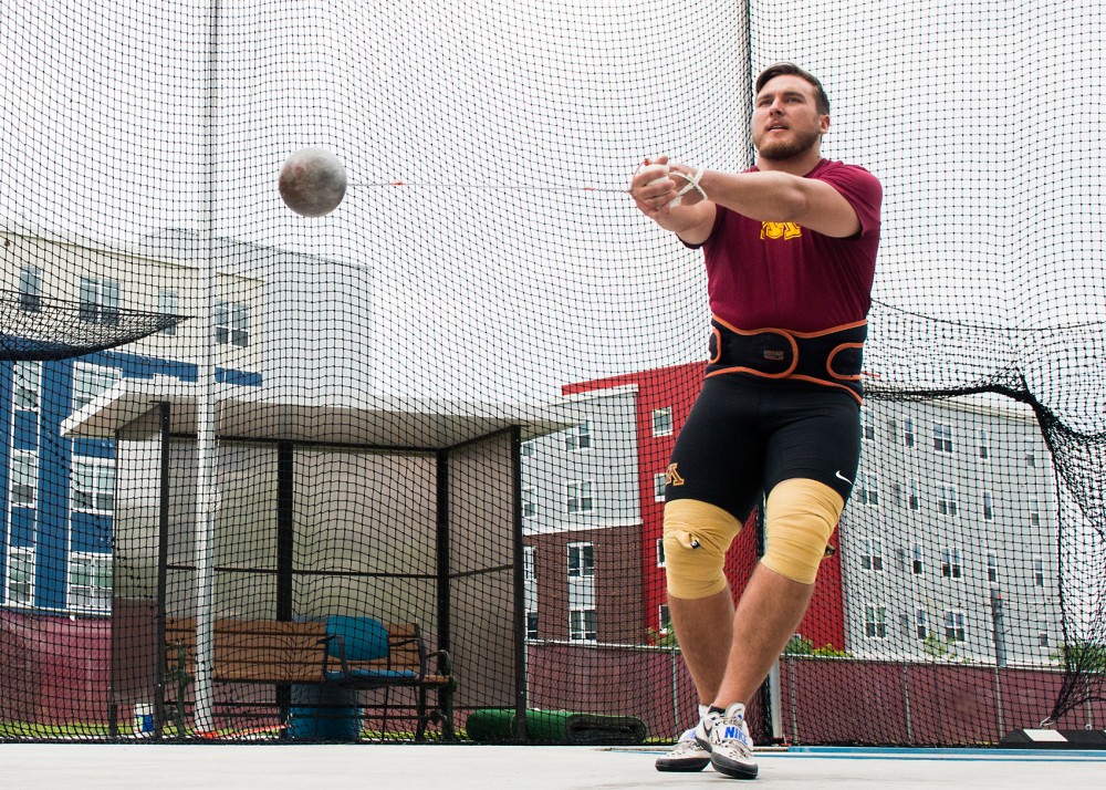 Senior Sean Donnelly practices the hammer throw at an outdoor practice field on June 4. 