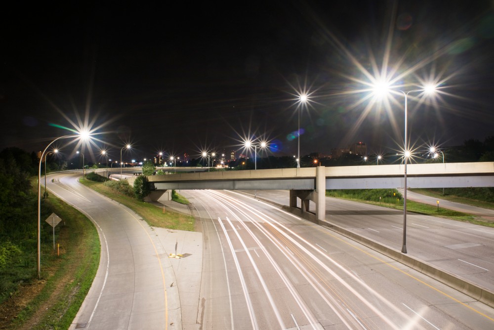 Cars drive down I-94 under the 27th Ave SE bridge early on Tuesday morning. Proposed plans include increased access to the interstate with an access point in Prospect Park. 