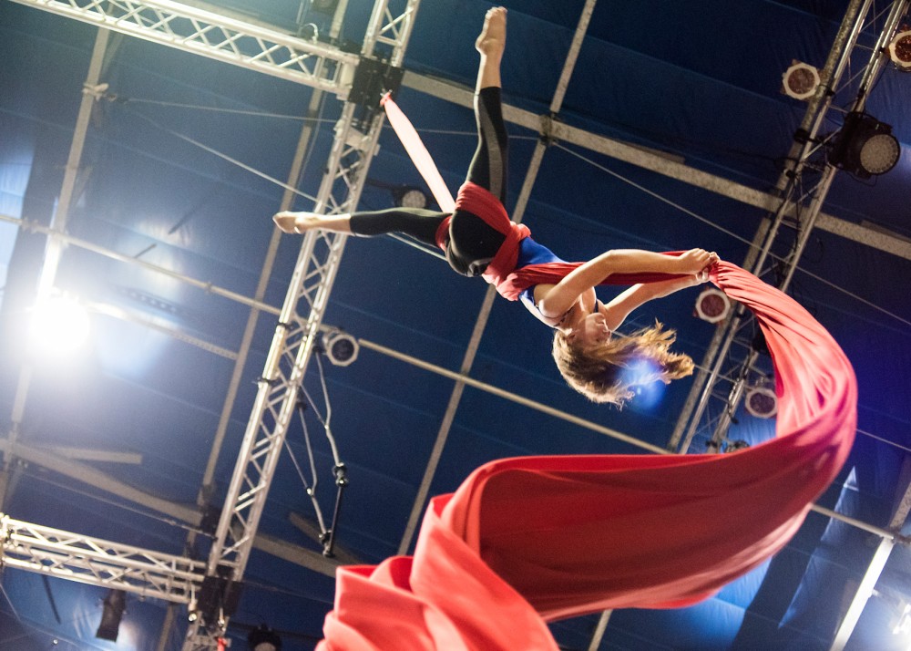 Abby Guggisberg practices aerial silks at Circus Juventas at their location in the Highland neighborhood of St. Paul on July 22.