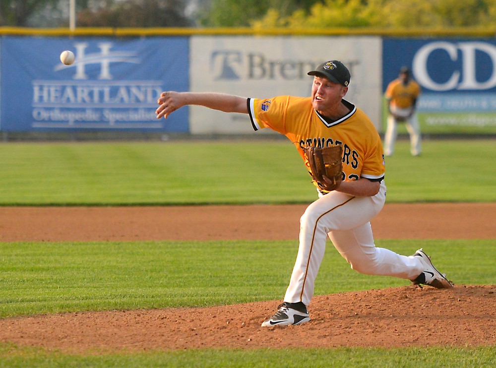 Tyler Hanson pitches for the Willmar Stingers in a game against the Rochester Honkers at the Bill Taunton Stadium in Willmar, Minn., on July 9, 2015.