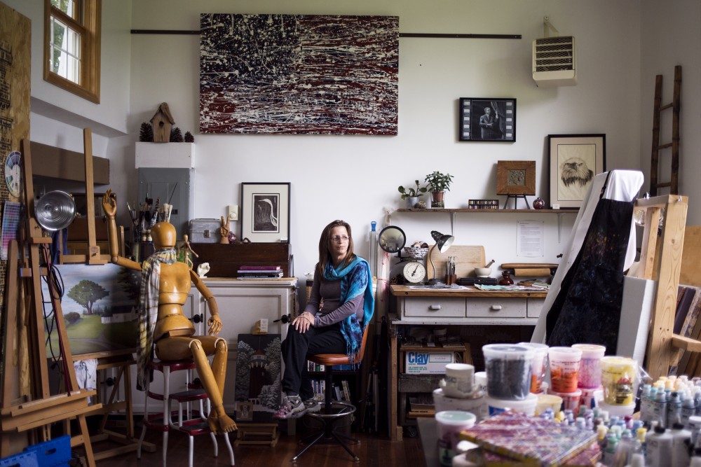 Cynthia Weitzel sits in her artist studio at the Anderson Center in Red Wing, Minn., where she has had a permanent residency since 2011. In 2014, Weitzel founded and helped coordinate a monthlong residency program for deaf artists, the first of its kind in the country. A deaf artist herself, Weitzel describes the residency as a beautiful and unique opportunity. This past June, she was able to successfully host the second Deaf Artists Residency Program at the Anderson Center.