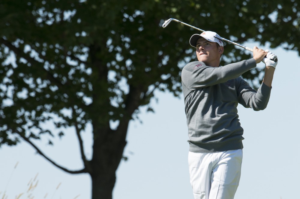 Junior Riley Johnson plays at the Windsong Golf Club during the Gopher Invitational on Sept. 13, 2015.
