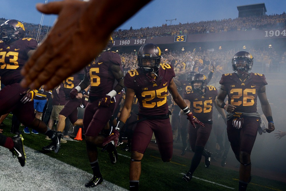 The Gohpers make their way on to the field prior to the start of their game against the Oregon State Beavers on Thursday, Sept. 1, 2016 at TCF Bank Stadium. 