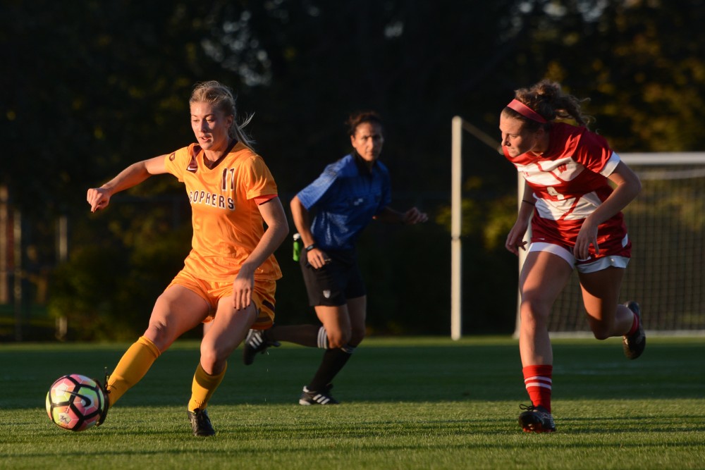 Senior midfielder Josee Stiever rushes for the ball against Wisconsin on Saturday, Oct. 1, 2016 at Elizabeth Lyle Robbie Stadium in St. Paul. Minnesota lost to Wisconsin in overtime 1-0 after both teams went scoreless through the game. 