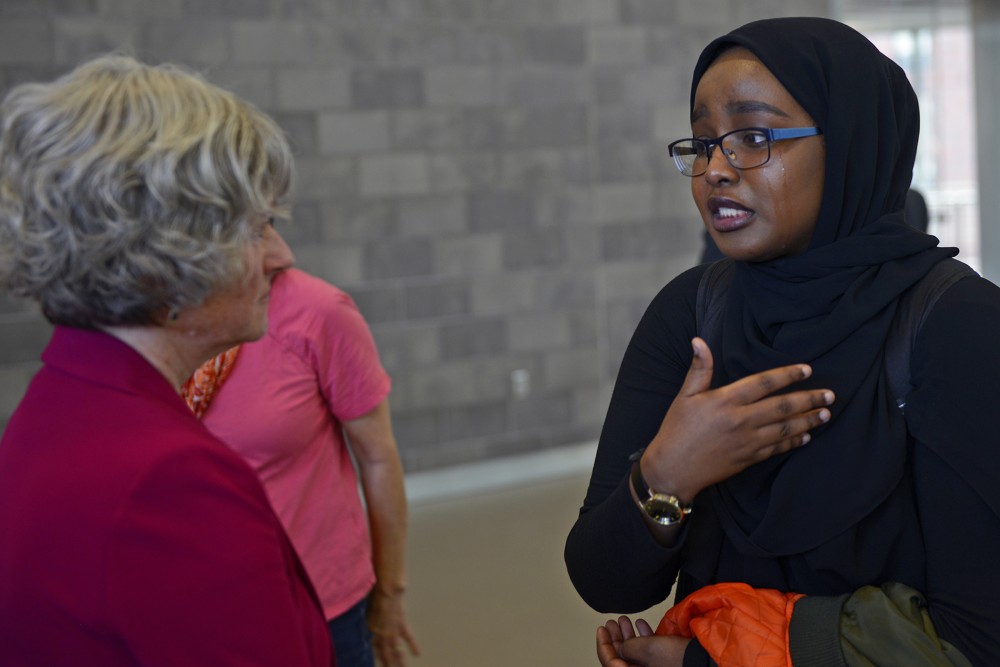 Samaya Mohamed right, speaks with Teddie Potter after the campus conversation ended on Thursday, Oct. 6, 2016 at the University Recreation and Wellness Center. Samaya was one of the protesters that spoke in front of the crowd addressing President Kahlers email that made her personally feel unsafe from it.  