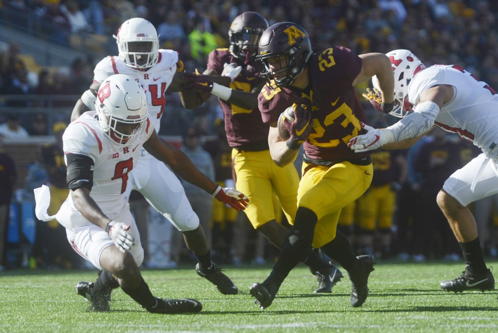 Rutgers attempts to take down Gophers running back Shannon Brooks on Saturday, Oct. 22, 2016 at TCF Bank Stadium.