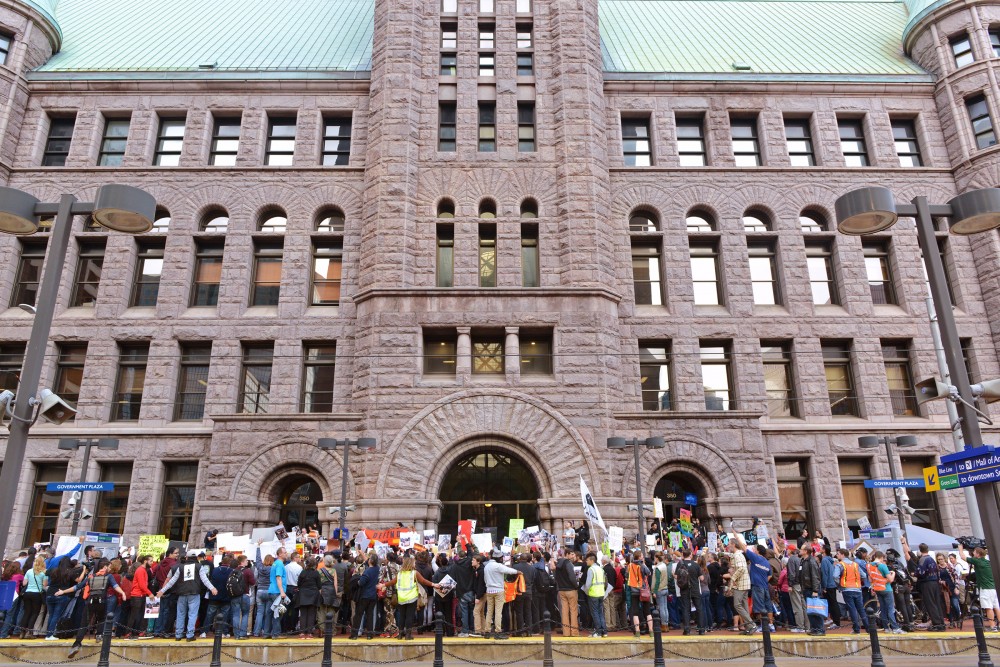 Protesters gather outside Minneapolis City Hall on Friday Oct. 28, 2016. Protestors rallied together to show their opposition to the Dakota Access Pipeline and the Hennepin County Sheriffs deputies participation in dispersing protesters.
