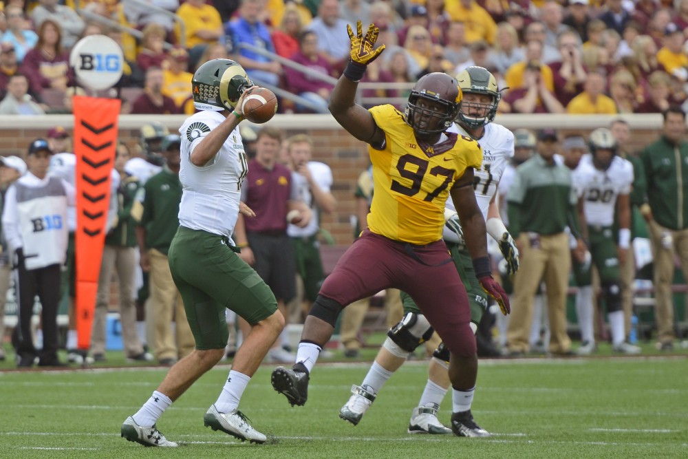 Defensive end Scott Ekpe attempts to block a pass by Colorado State at TCF Bank Stadium on Sept. 24, 2016.