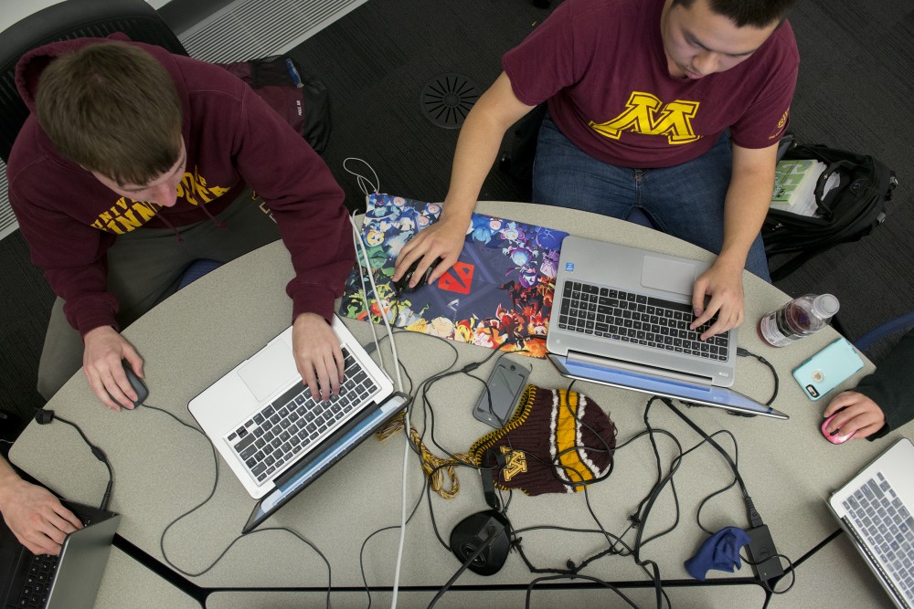 Computer science sophomores Calvin Greve, left, and James Han, right, play Dota 2 on Wednesday, Oct. 26, 2016 at Bruininks Hall on East Bank during the uDota clubs weekly meeting.
