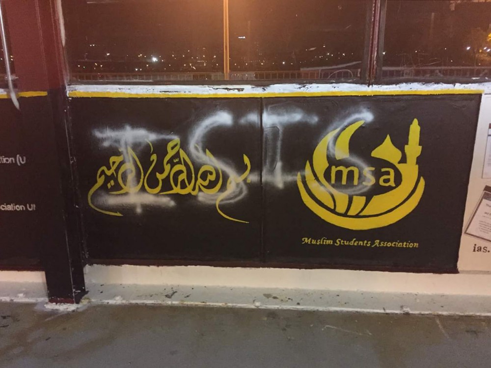 The Muslim Students Association panel on the Washington Avenue bridge was defaced with the phrase ISIS. The vandalism was discovered on Nov. 3, 2016.