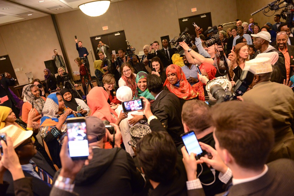 House District 60B-elect Ilhan Omar walks into her election party in the Courtyard Marriott on West Bank in Minneapolis on Tuesday, Nov. 8, 2016. Omar won the seat for House District 60B.