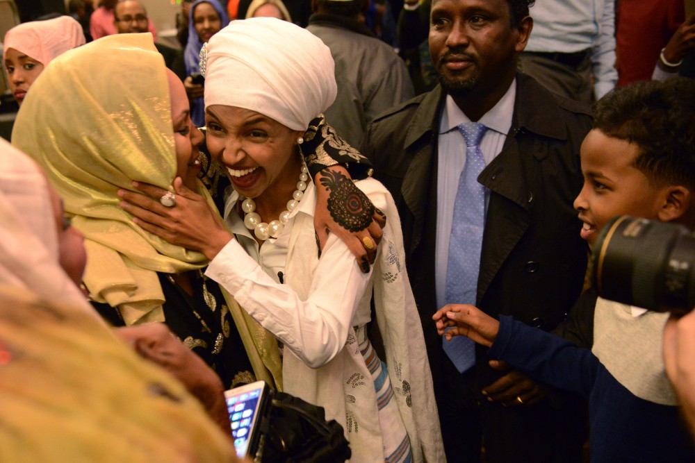 House District 60B-elect Ilhan Omar greets a supporter at her election party in the Courtyard Marriott on West Bank in Minneapolis on Tuesday, Nov. 8, 2016. Omar won the seat for House District 60B.