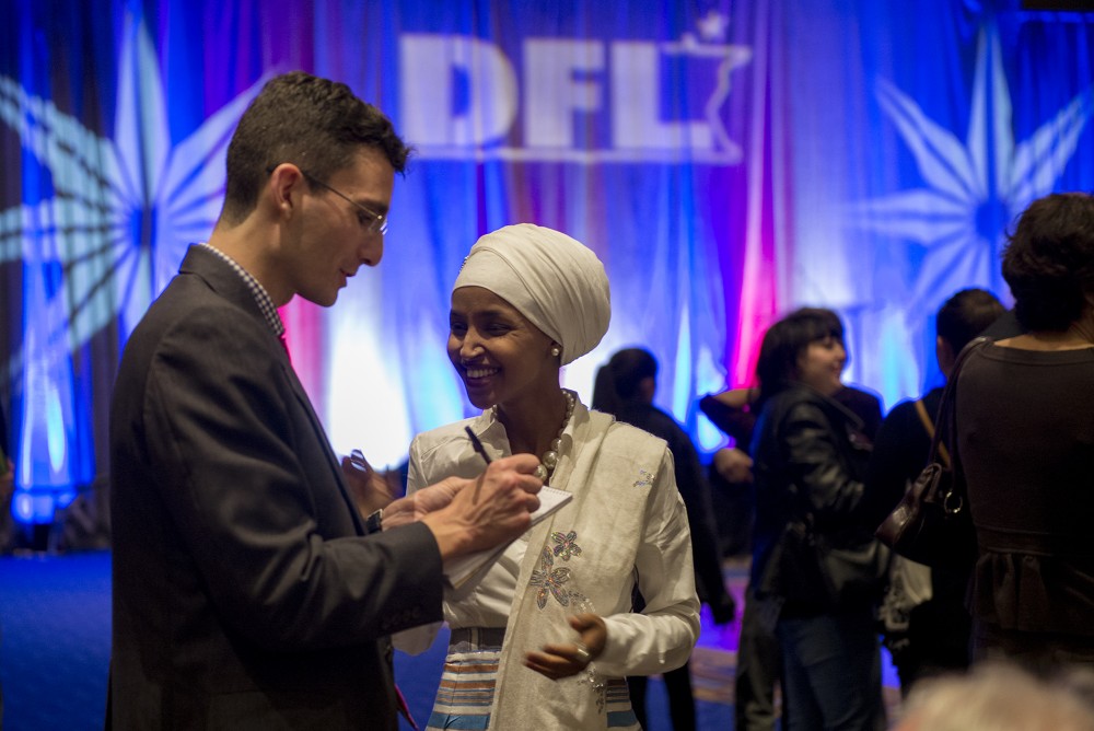 Newly elected rep. Ilhan Omar talks to members of the press after her win was called at the Minnesota DFL election night party at the Minneapolis Hilton on Tuesday, Nov. 8, 2016.