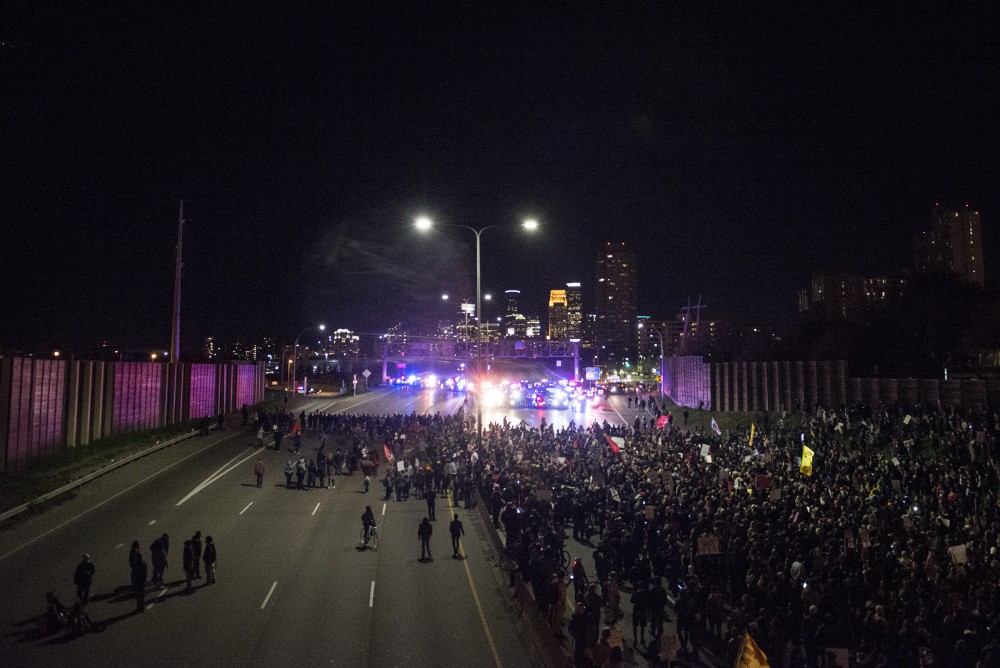 Hundreds gather on interstate 94 in Minneapolis for a  an anti-trump protest on Thursday, Nov. 10, 2016.