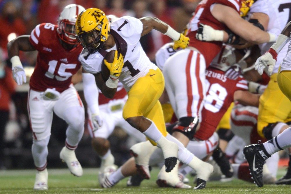 Gophers running back Rodney Smith runs the ball against the Cornhuskers at Memorial Stadium in Lincoln, Nebraska on Saturday.