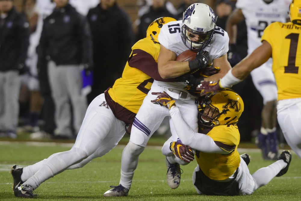 Junior wide receiver Macan Wilson is tackled by the Gophers defense at TCF Bank Stadium on Saturday, Nov. 19, 2016. The Gophers would win 29-12 against Northwestern University.