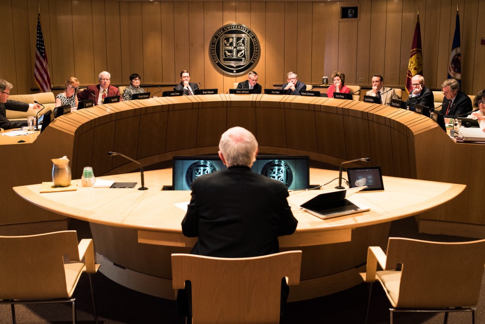 The Universitys Board of Regents talk at a meeting on June 10, 2016. 