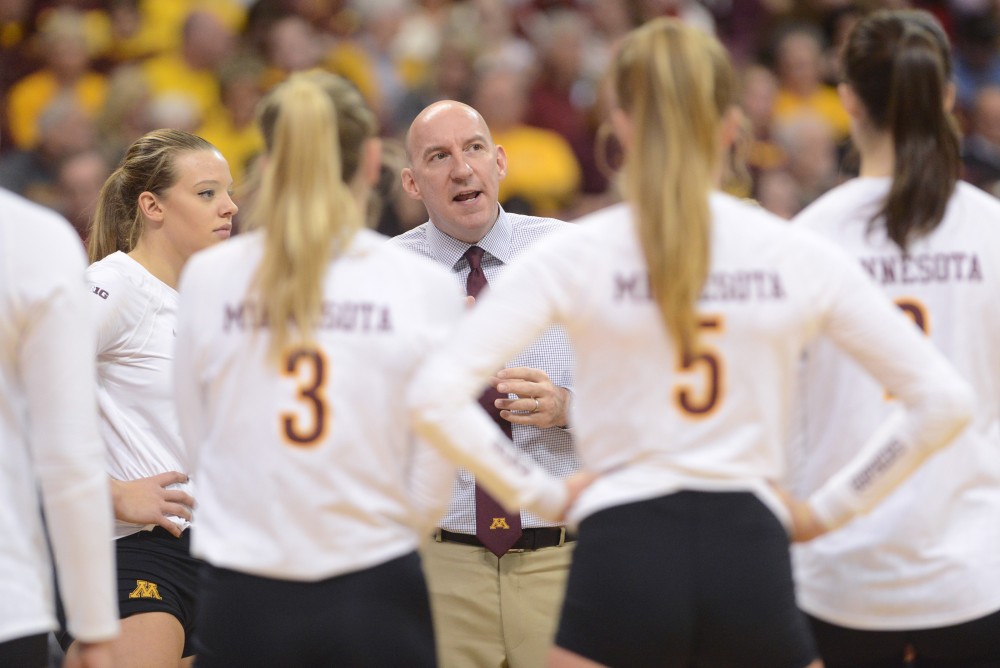 Head coach Hugh McCutcheon talks with the gophers on Saturday, December 3. 2016 at the Sports Pavilion. The Gophers won against the University of Hawaii.