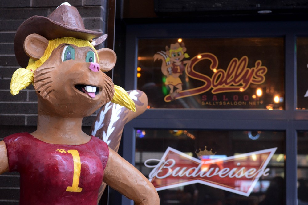 A statue of Sallys mascot stands outside on the porch of Sallys on Tuesday, Jan. 17, 2016 in Stadium Village on East Bank.