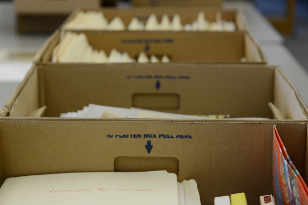 Boxes of writers material are laid out Tuesday, Jan. 17, 2017 at Andersen Library on West Bank. After receiving a grant, the Universitys Upper Midwest Literary Archives department is sorting through new materials that provide insight into Minnesota writers processes.