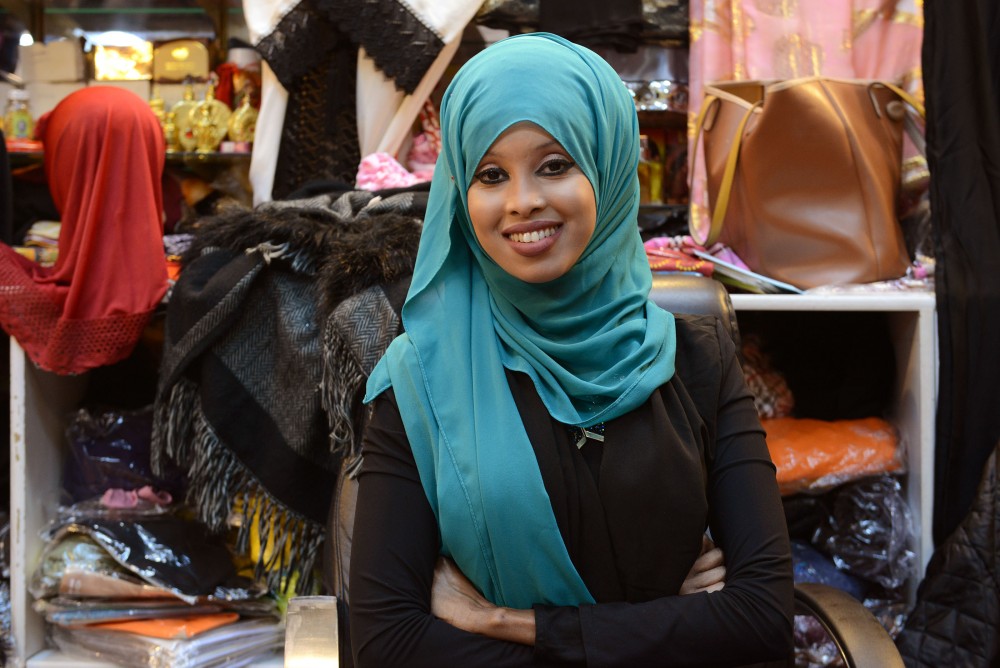 Store owner Nimo Naalin poses for a portrait inside her store on Tuesday Jan. 24. at Village Market in Minneapolis.