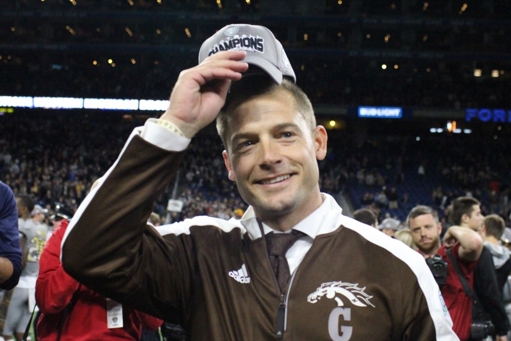 P.J. Fleck tips his cap after a 29-23 win over Ohio in the 2016 MAC Championship. With an average annual salary of $3.6 million, Fleck is the highest paid coach in Gophers history.