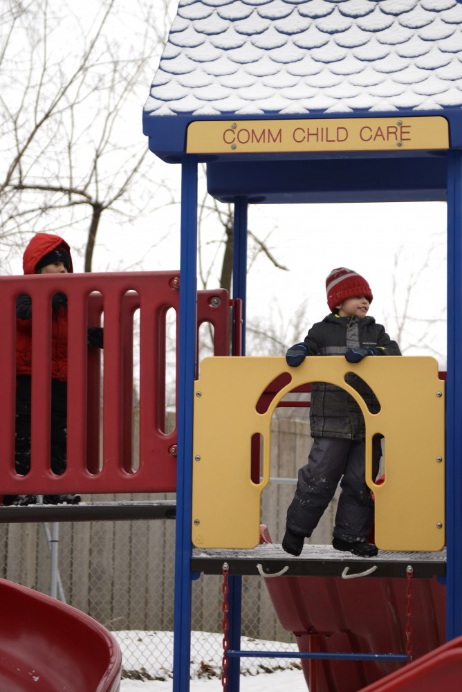 Children climb on the jungle gym at the Community Child Care Center at the University of Minnesota in St. Paul on Monday, Jan. 30, 2017.