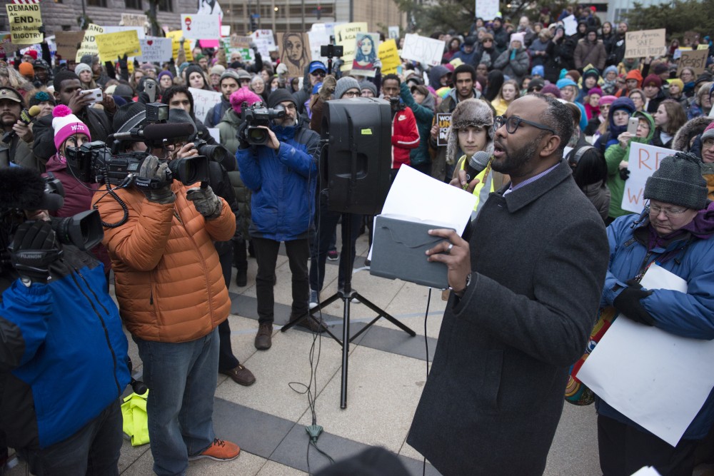 Jaylani Hussein, Executive Director of The Council on American-Islamic Relations Minnesota, addresses the crowd gathered outside the Federal Courthouse in Minneapolis on Tuesday, Jan. 31, 2017. 