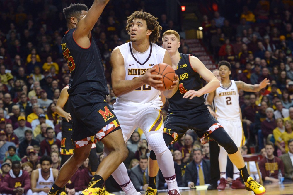 Redshirt junior Reggie Lynch looks to shoot on Jan. 28 at the Sports Pavilion.