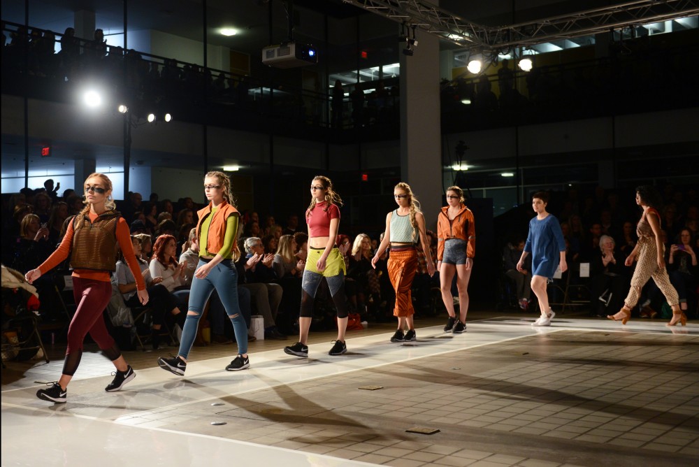 Sarah Kleckers models come out in a collection called Spark in Rapson Hall on Saturday, Feb. 4, 2017. Sarah has always been interested in how innovative and fashionable apparel can have a profound impact on an athletes performance. 