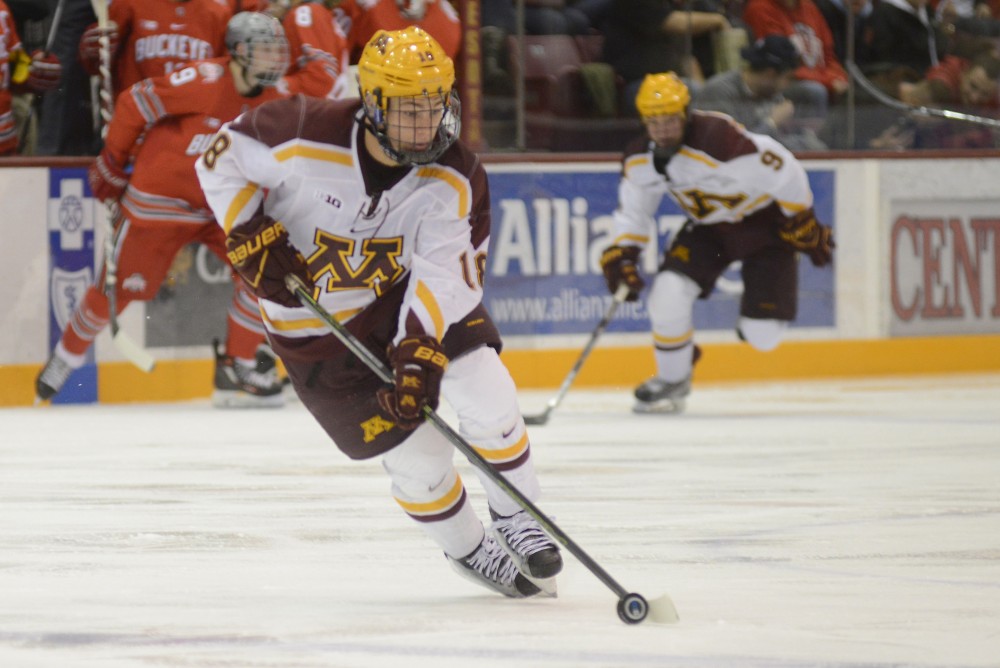 Gophers forward Leon Bristedt carries the puck into the Ohio State zone on Dec. 2, 2016, at Mariucci Arena.